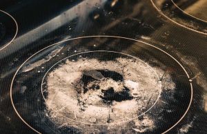 My glass stove top looks gross and may even be damaged. What should I do?